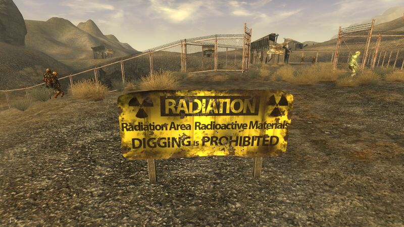 Datei:Nuclear test site radiation sign.jpg