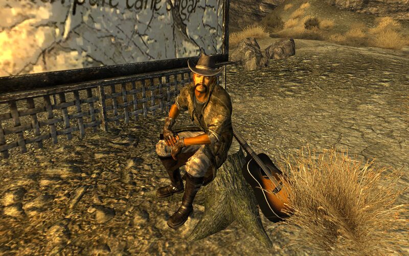 Datei:Lonesome Drifter with guitar.jpg
